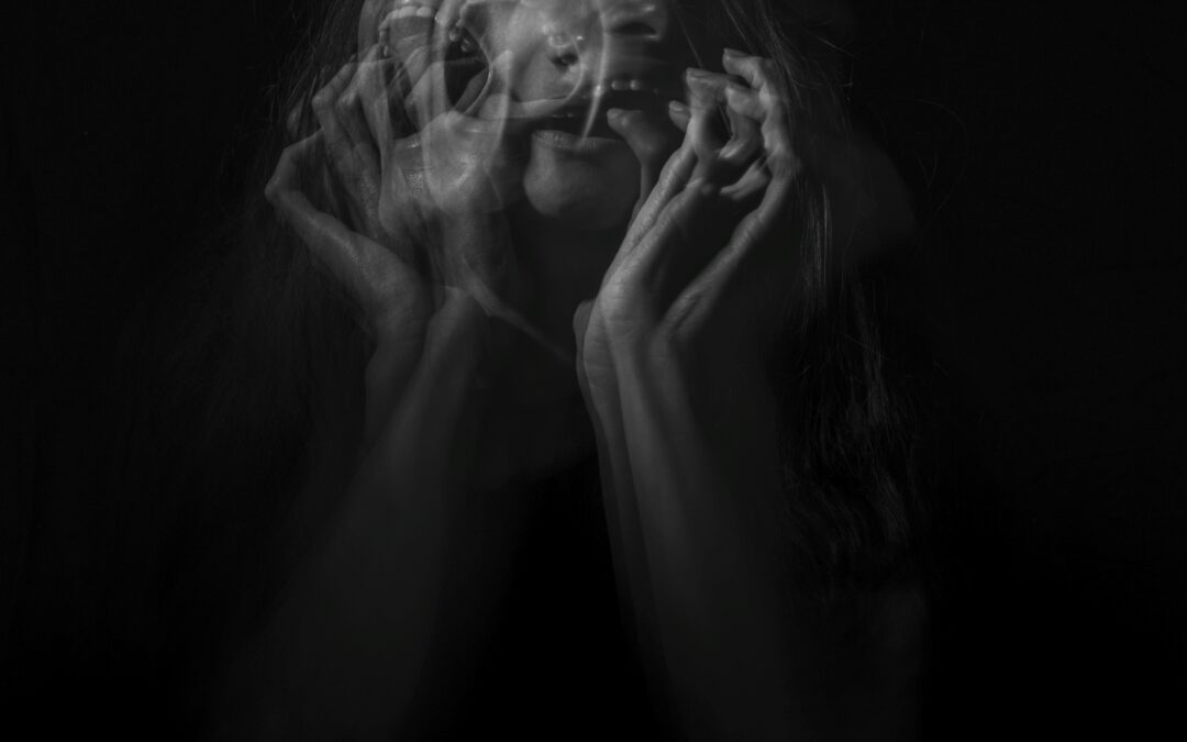 Blurred woman's face with black background