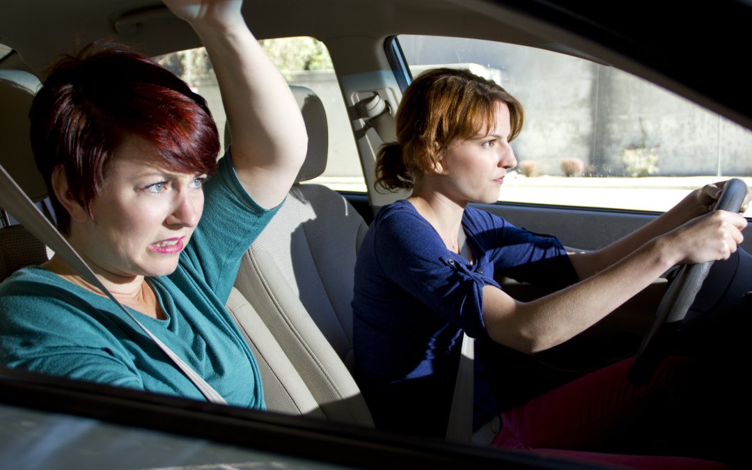 two women bracing for a car crash accident