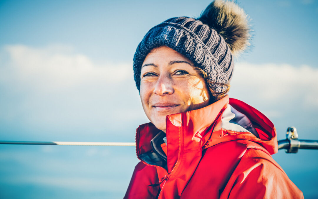 Happy woman sailor sailing